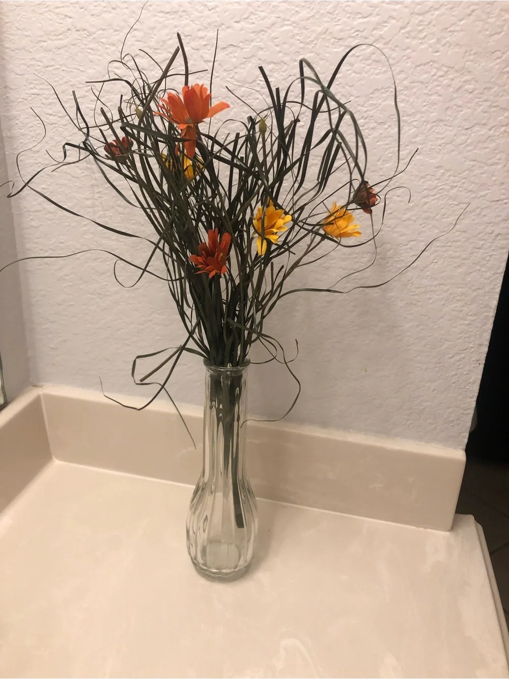 Decorative Orange and Yellow Artificial Flower Bouquet in Clear Glass Vase